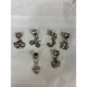 6 silver‎ colored charms for charm bracelet